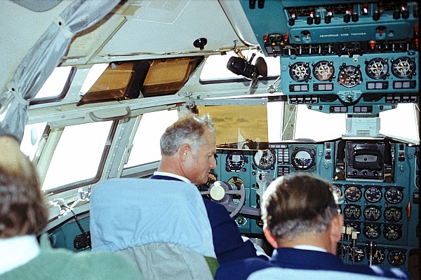 Capitan Edward Kamela with his crew in the Il-62 cockpit